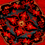 Closeup of red and black quality Oriental rug