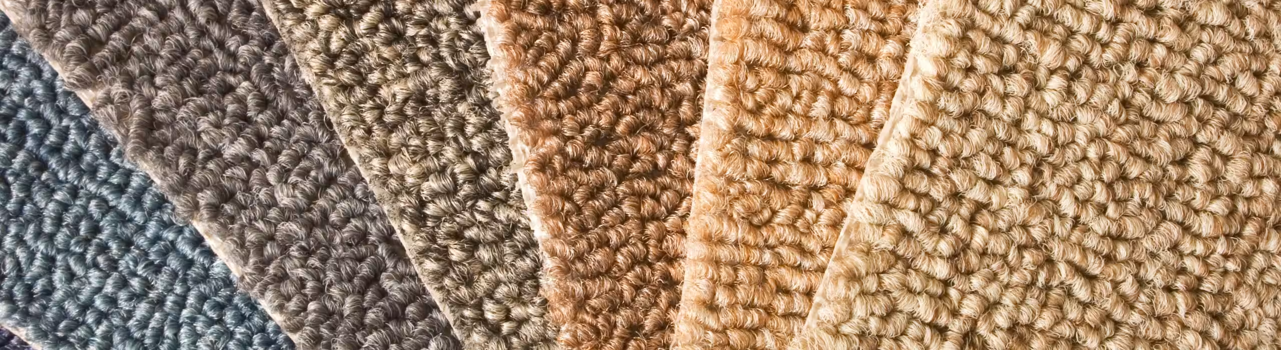 Several colorful carpet samples
