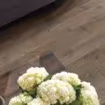 Overhead of luxury vinyl tile flooring that looks like wood