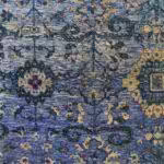 ruggallery-pantone-color-year-8 Closeup of traditional floral rug design featuring Pantone Color of the Year 2022, Very Peri, with shades of light gray and blue