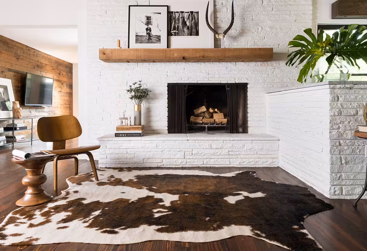 A room with a animal rug in the middle of it